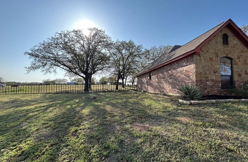 Springtown House | Country home with a brand new hot tub, WiFi and central air, spacious bad yard
