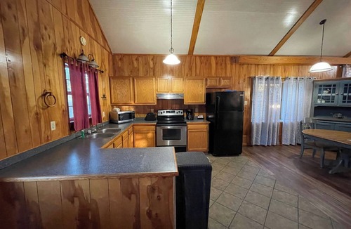 Zwolle Cabin | Couples Retreat with King Canopy Bed, Jacuzzi for Two, Fireplace & Pond-View Porch