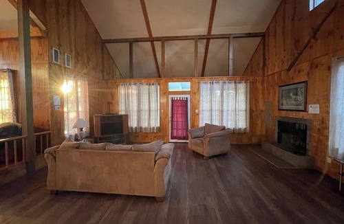 Zwolle Cabin | Couples Retreat with King Canopy Bed, Jacuzzi for Two, Fireplace & Pond-View Porch