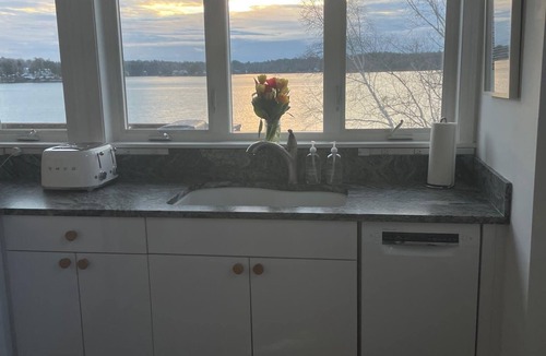 Sebascodegan Island House | Coveshead. Dramatic waterfront designer cottage.