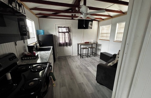 Richland Springs Cabin | Coyote Country White Cabin 1BR/1BA on a tall hill