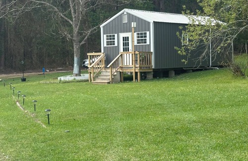 Lufkin Cabin | Cozy 1-bedroom cabin in beautiful Lufkin with a pond and sunset view.