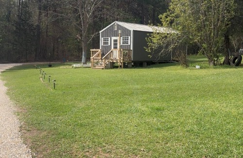 Lufkin Cabin | Cozy 1-bedroom cabin in beautiful Lufkin with a pond and sunset view.