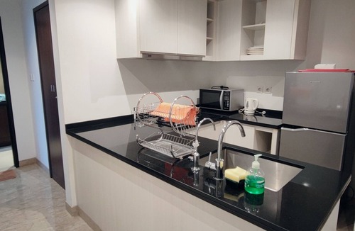 Bumi Serpong Damai Apartment | Cozy 2-bedroom apartment in enjoyable Banten with WiFi, fitness room