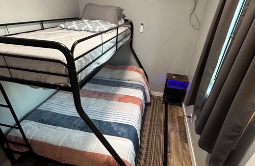 Camp Wood Cabin | COZY 2 BEDROOM CABIN 1/2 MILE FROM NUECES RIVER.