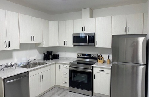 Saskatoon House | Cozy 2-Bedroom Suite in Aspen Ridge