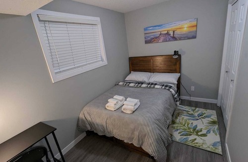 Regina Apartment | Cozy 2BR basement suite near the airport & highway—for every stay!