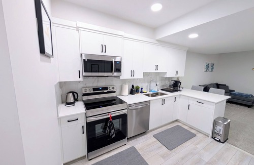 Silverado Apartment | Cozy 2BR Suite | Near CTrain, Spruce Meadows & Parks | Modern Comforts Await!