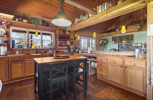 Denison Cabin | Cozy 3 bedroom cabin on private land look at beautiful trees , Storms and Cows!