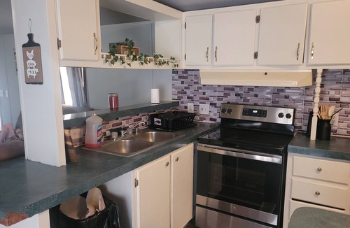 Odell House | Cozy 3-bedroom mobile home with WiFi, AC, game room just outside of Eldorado.