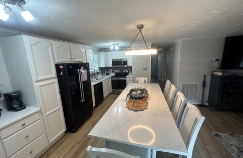 Tranquil Harbour House | Cozy 4 Bedroom beach bungalow with private HEATED pool & golf cart.