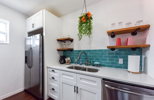 Port Canaveral House | Cozy 4Bd/2Ba House with 2 Kitchens, short walk to the beach