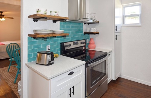Port Canaveral House | Cozy 4Bd/2Ba House with 2 Kitchens, short walk to the beach