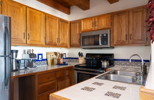 Arroyo Seco Apartment | Cozy adobe studio with private balcony, mountain views, and classic Southwest charm—just minutes from Taos, Arroyo Seco, and Taos Ski Valley. Perfect for a peaceful canyon escape with modern comforts.