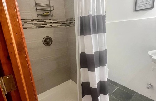 Queens Apartment | Cozy and charming studio brought by Zoller Stays. Comfortable and spacious