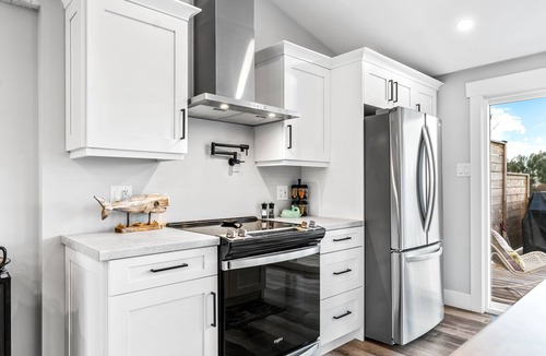 Cormierville Cottage | Cozy and Modern Oceanview Cottage With hot Tub