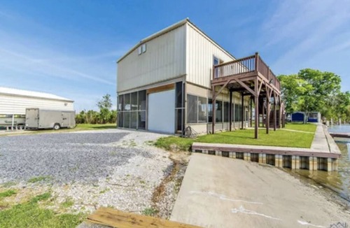 Theriot House | Cozy Bayou Fishing Camp on Brady Road with private Boat Launch and great views!