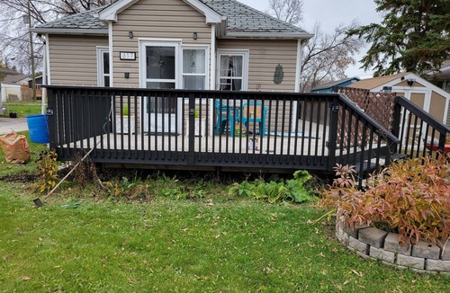 Winnipeg Beach House | Cozy beach cottage with fire pit and suitable for a family or romantic getaway!