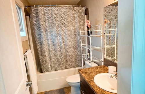 Southeast Calgary House | Cozy bedroom in a townhouse in Copperfield Calgary