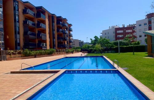 Lloret de Mar Apartment | Cozy & Bright 2BR with Balcony, Pool & Garden View- Fenals