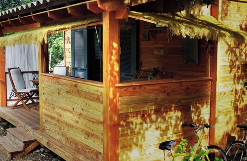 Saint-Andre-de-Cruzieres Ski Chalet | Cozy cottage under the oaks with outdoor kitchen, ideal for recharge.