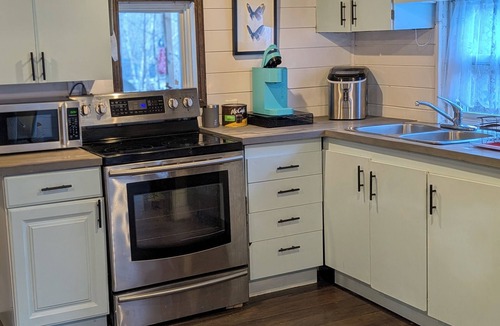 Barss Corner House | Cozy Cabin in Barss Corner with hot tub. Pet-Friendly!