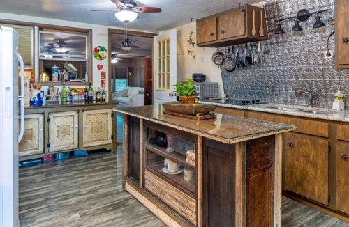 Grove Cabin | Cozy cabin in delightful Grove with boat dock and slip, WiFi, AC, and wood stove