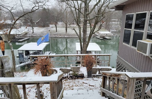 Grove Cabin | Cozy cabin in delightful Grove with boat dock and slip, WiFi, AC, and wood stove
