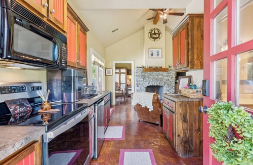 Okmulgee County Cabin | Cozy Cabin in the Country with resort style pool! Secluded, Slide and Waterfall