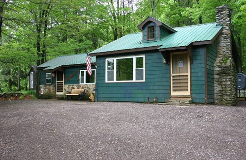 Benton House | Cozy Cabin - Step into spring with comfort, fresh air, and room to unwind.