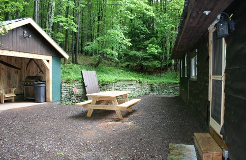 Benton House | Cozy Cabin - Step into spring with comfort, fresh air, and room to unwind.