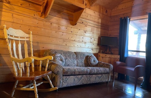Octavia Cabin | Cozy Cabin with Fire Pit pavilion near boat ramp