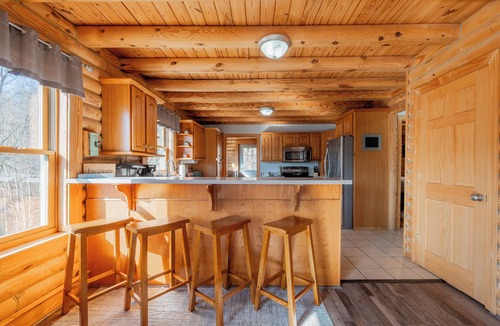 Christiansburg House | Cozy cabin with mountain views, game room, fire pit, soaking tub, and bright gathering spaces
