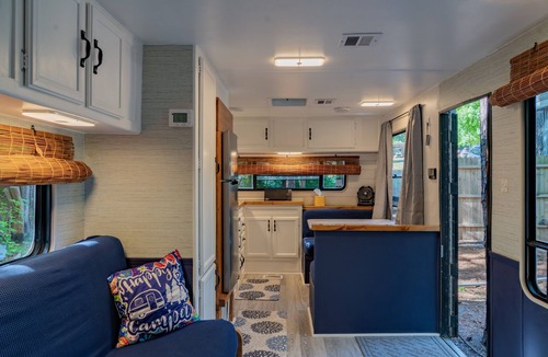 Littleton Cabin | Cozy camp cabin & RV with fire pit, outdoor dining, games, kayaks and more!