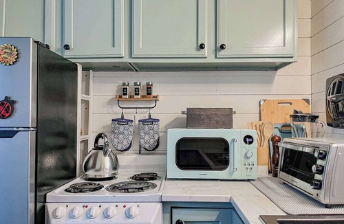 Littleton Cabin | Cozy camp cabin & RV with fire pit, outdoor dining, games, kayaks and more!