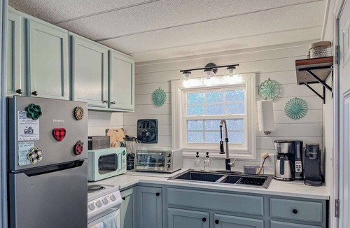 Littleton Cabin | Cozy camp cabin & RV with fire pit, outdoor dining, games, kayaks and more!
