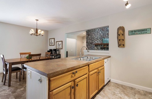 Bellaire Ski Chalet | Cozy Chalet close to pool, skiing, golfing, & torch lake! Perfect for families!