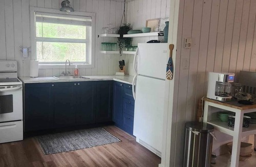 Cambridge-Narrows Cottage | Cozy Cottage One row off the lake with lake access.