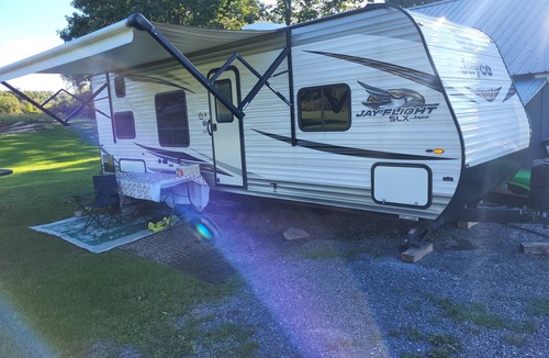 Evans Mills RV Rental | Cozy Country Camper!