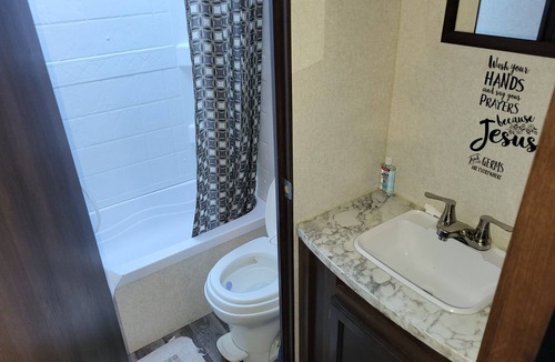 Evans Mills RV Rental | Cozy Country Camper!