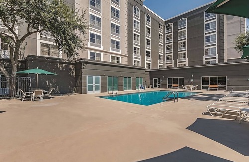 Arsenal Hotel | Cozy Downtown Retreat - Steps from The Alamo & River Walk Adventures