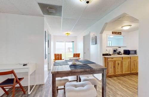 Ingleside on the Bay House | Cozy duplex with beach access, bikes, patio with bay views