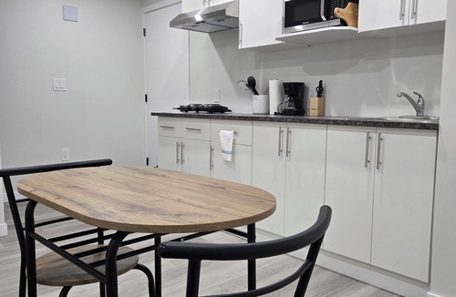Winnipeg House | Cozy Family-sized basement suite.