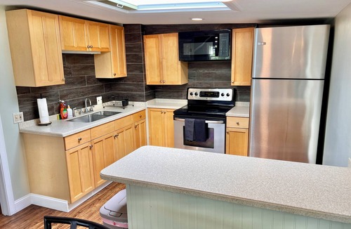 Plaistow Apartment | Cozy Getaway with Deck & Backyard