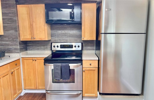 Plaistow Apartment | Cozy Getaway with Deck & Backyard