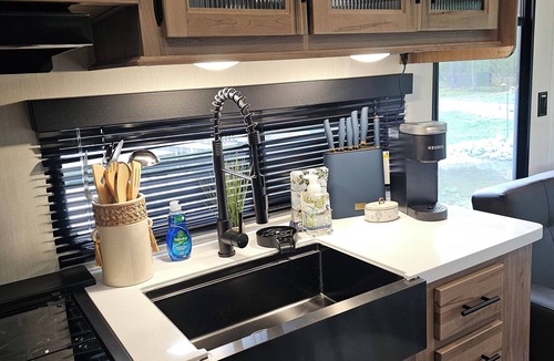 Freetown RV Rental | Cozy glamper with scenic pond in Brownstown Indiana