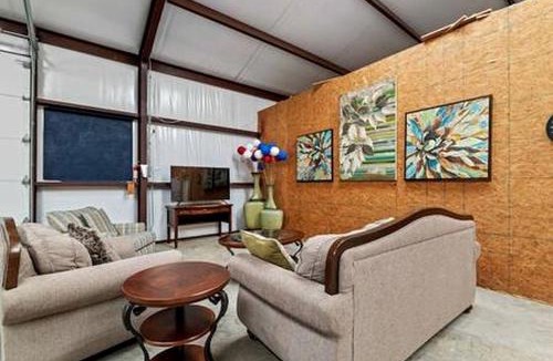 Wolfe City House | Cozy Glamping Retreat with Outdoor Shower & Fire Pit near Wolfe City, Texas