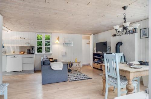 Logstor House | Cozy Holiday Home With Terrace And Wood-Burning Stove Close To The Water