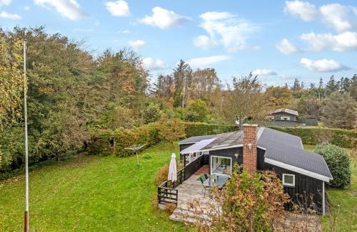 Logstor House | Cozy Holiday Home With Terrace And Wood-Burning Stove Close To The Water