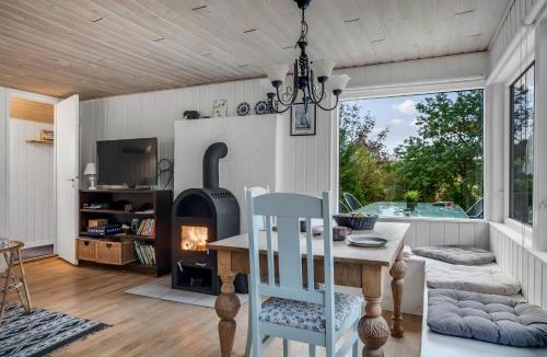 Logstor House | Cozy Holiday Home With Terrace And Wood-Burning Stove Close To The Water